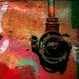 graffiti wall with lightswitch